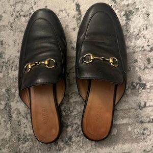Gucci Black Leather Mules with Gold Hardware